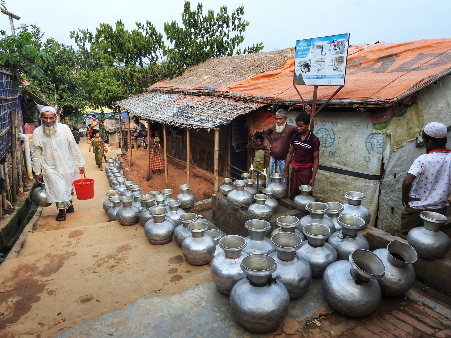 Photo of water pitchers in Camp 5 by Zahangir Alam